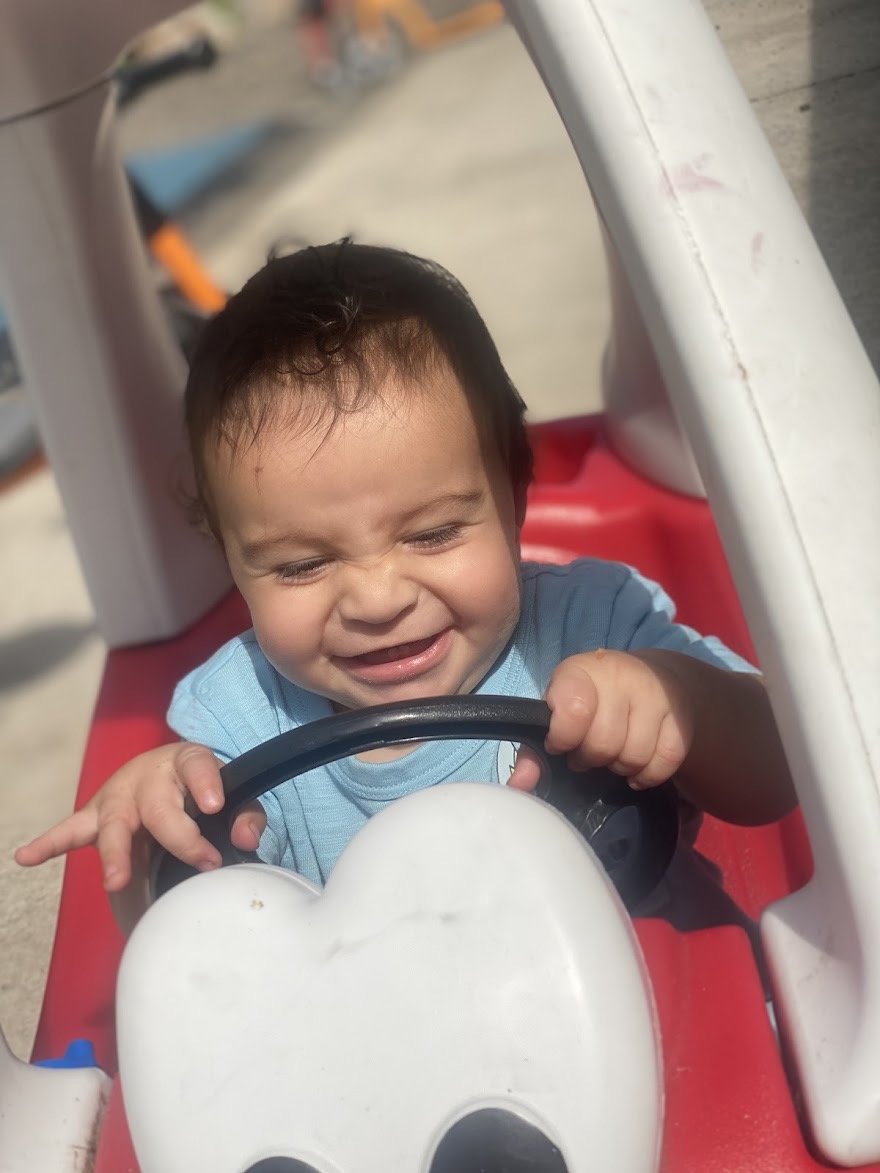 Happy baby at Firefly Family Collective
